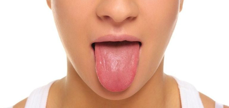 5 Reasons Why Everyone Needs A Tongue Scraper